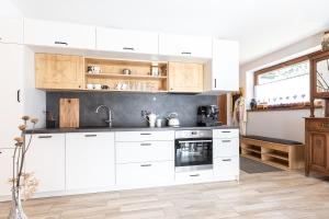 Kuchyňa alebo kuchynka v ubytovaní Apartament Słoneczne Tatry Droga na bystre 5b