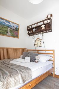 Posteľ alebo postele v izbe v ubytovaní Apartament Słoneczne Tatry Droga na bystre 5b