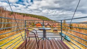 En balkon eller terrasse på Apartament Cichy - 5D Apartamenty