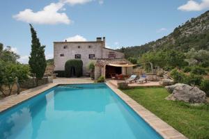 The swimming pool at or close to Can Guillo