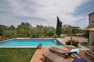 The swimming pool at or close to Can Guillo
