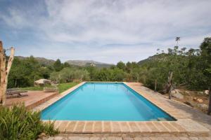 The swimming pool at or close to Can Guillo