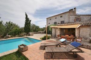 The swimming pool at or close to Can Guillo