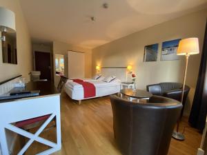 Postel nebo postele na pokoji v ubytování Nordby Hotell