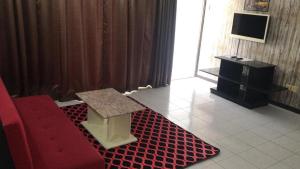 TV a/nebo společenská místnost v ubytování GALAXY HOME Batu Ferringhi