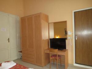 TV a/nebo společenská místnost v ubytování Hotel Massimo