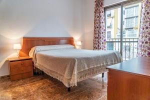 Ein Bett oder Betten in einem Zimmer der Unterkunft Apartamento Señorio