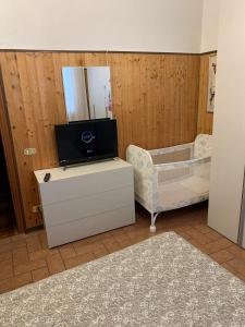 TV a/nebo společenská místnost v ubytování Casa Fabbrichina