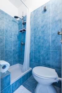 Kúpeľňa v ubytovaní Kelava Rooms