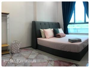 Postel nebo postele na pokoji v ubytování Meru Oasis at Casa Kayangan Ipoh + 36 fotografií