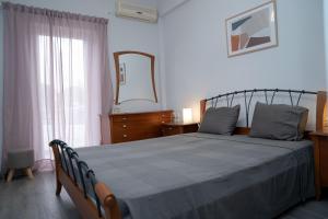 Postel nebo postele na pokoji v ubytování Sea & View Villas