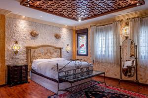 Postel nebo postele na pokoji v ubytování Casa de Reyes