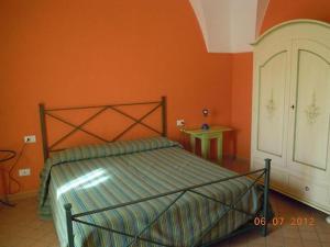 Posteľ alebo postele v izbe v ubytovaní Residence Degli Ulivi Pantelleria