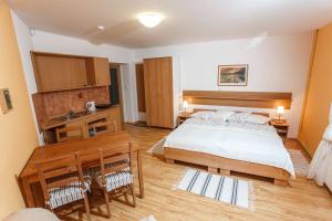 Posteľ alebo postele v izbe v ubytovaní Apartmány Podyjí