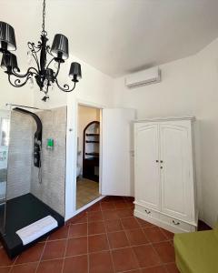 Postel nebo postele na pokoji v ubytování Dolce Vita Suite Alghero