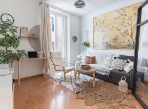 Posezení v ubytování Appartement 1er étage piéton Place de la Pierre