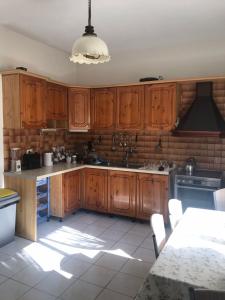 Kuchyň nebo kuchyňský kout v ubytování Tirana City Rooms - Vatra e Lagjes by Paymán Club