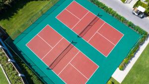 Tennis ja/või seinatennis majutusasutuses Hammock Cove Antigua - All Inclusive - Adults Only või selle läheduses