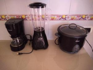 Все необхідне для приготування чаю та кави в Apartamento Nómadas