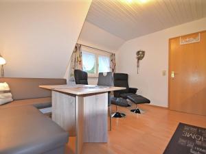 Een TV en/of entertainmentcenter bij Idyllic holiday home in a mansion with garden in the beautiful Black Forest
