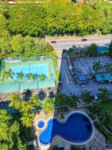 AGODA C VIEW @ Sri Sayang Beach Resort内部或周边的泳池