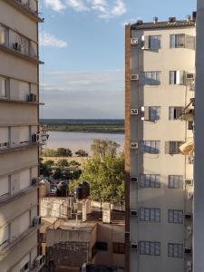 a view from the window of an apartment building at Moderno monoambiente con vista al Río in Rosario