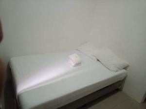 Letto o letti in una camera di Lei Kendee