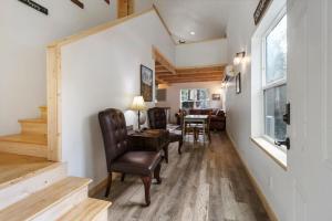 a hallway with a living room and dining room at Kelton's Cabin in Ashford