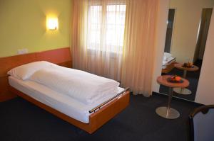 Voodi või voodid majutusasutuse Hotel Urs und Viktor toas