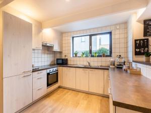 A kitchen or kitchenette at Restful Holiday home in Herselt with Garden
