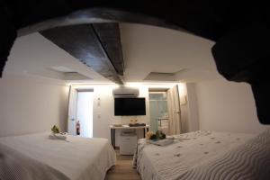 Postel nebo postele na pokoji v ubytování FP HOTELs