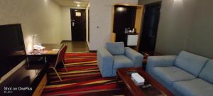 Coin salon dans l'établissement Nehal Hotel