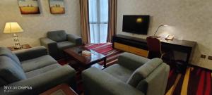 Télévision ou salle de divertissement dans l'établissement Nehal Hotel