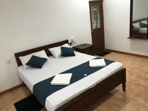 Letto o letti in una camera di Miyonra - Anuradhapura