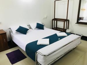 Letto o letti in una camera di Miyonra - Anuradhapura