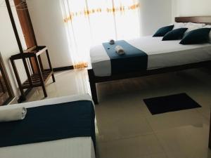Letto o letti in una camera di Miyonra - Anuradhapura