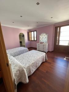 Posteľ alebo postele v izbe v ubytovaní Apartamento Vila O Valadouro 2