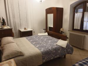 Posteľ alebo postele v izbe v ubytovaní Agriturismo Cognanello