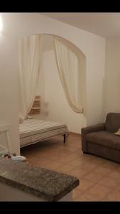 A seating area at Appartamentino tipico nel centro