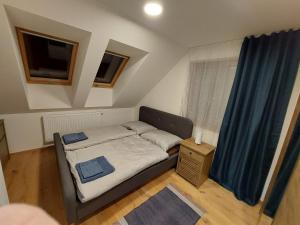 Posteľ alebo postele v izbe v ubytovaní Mýto Apartments BERGMAX, Ski Jasná Chopok 10min transit - Resort Mýto Apartments, parking free