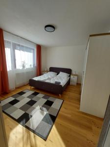 Posteľ alebo postele v izbe v ubytovaní Mýto Apartments BERGMAX, Ski Jasná Chopok 10min transit - Resort Mýto Apartments, parking free