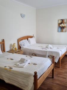 Кровать или кровати в номере Residencia Salva-Vidas