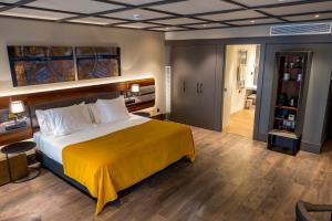 Hotel Nord 1901客房内的一张或多张床位