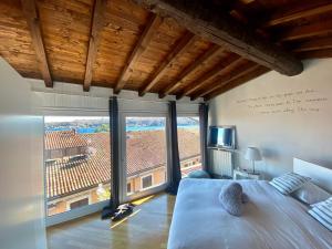 A bed or beds in a room at La casa di Angelina