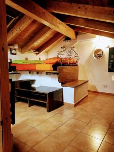 a room with a bed on top of a table at La casa di Maya in Sassari