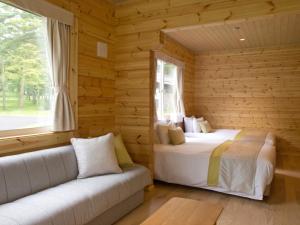 Ένα ή περισσότερα κρεβάτια σε δωμάτιο στο The Prince Villa Karuizawa