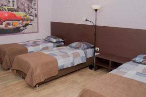 Katil atau katil-katil dalam bilik di Центральный гостевой дом