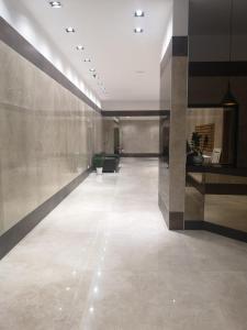 a hallway of a building with a hallwayngth at Urban Chic Home in Bari