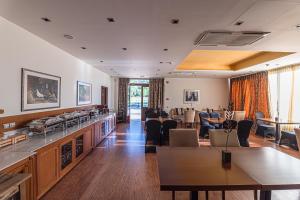Kuchyň nebo kuchyňský kout v ubytování Nymfasia Resort