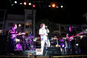 a group of people on a stage playing music at Apartment on the Plaza in Villamartin +20 photos